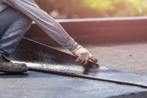 Professional Exterior Waterproofing technician working in Woodburn, OR